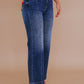 Stylish plus size jeans with high waist and trendy wide-leg cut in dark wash.
