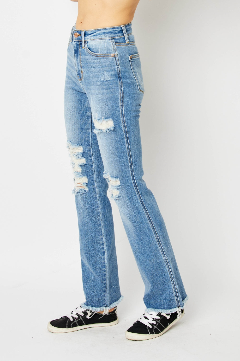 Judy Blue High-Rise Distressed Bootcut Jeans offering a flattering fit and unique style.