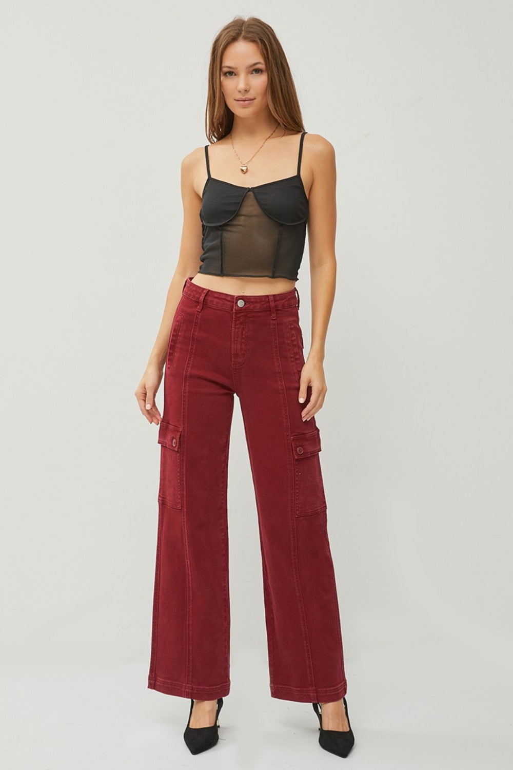 Fashion-forward cargo jeans with a wide leg silhouette and practical design.
