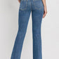 Stylish slant hem flare jeans with high waist and medium wash.
