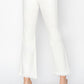 Cropped flare step hem pants in white, featuring a tummy control fit.
