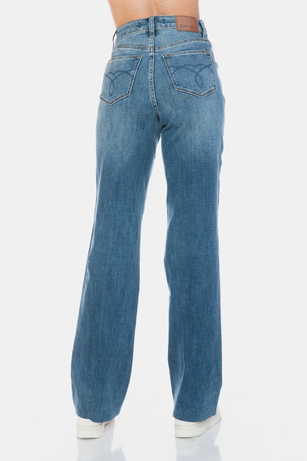 High-waist straight-leg jeans with tummy control feature.
