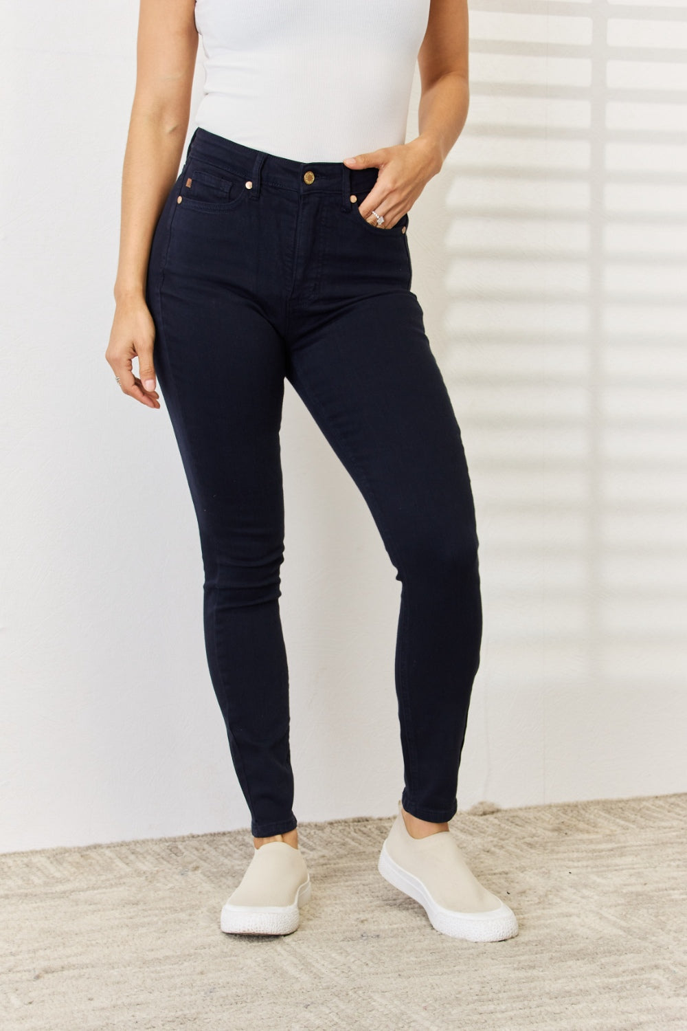 Flattering navy jeans featuring slimming design

