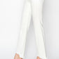 RISEN cropped flare pants in white with a step hem and tummy control.
