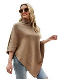 Women’s caramel poncho featuring a soft turtleneck and relaxed fit.
