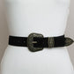 Stylish black suede western belt featuring a detailed antique gold buckle.
