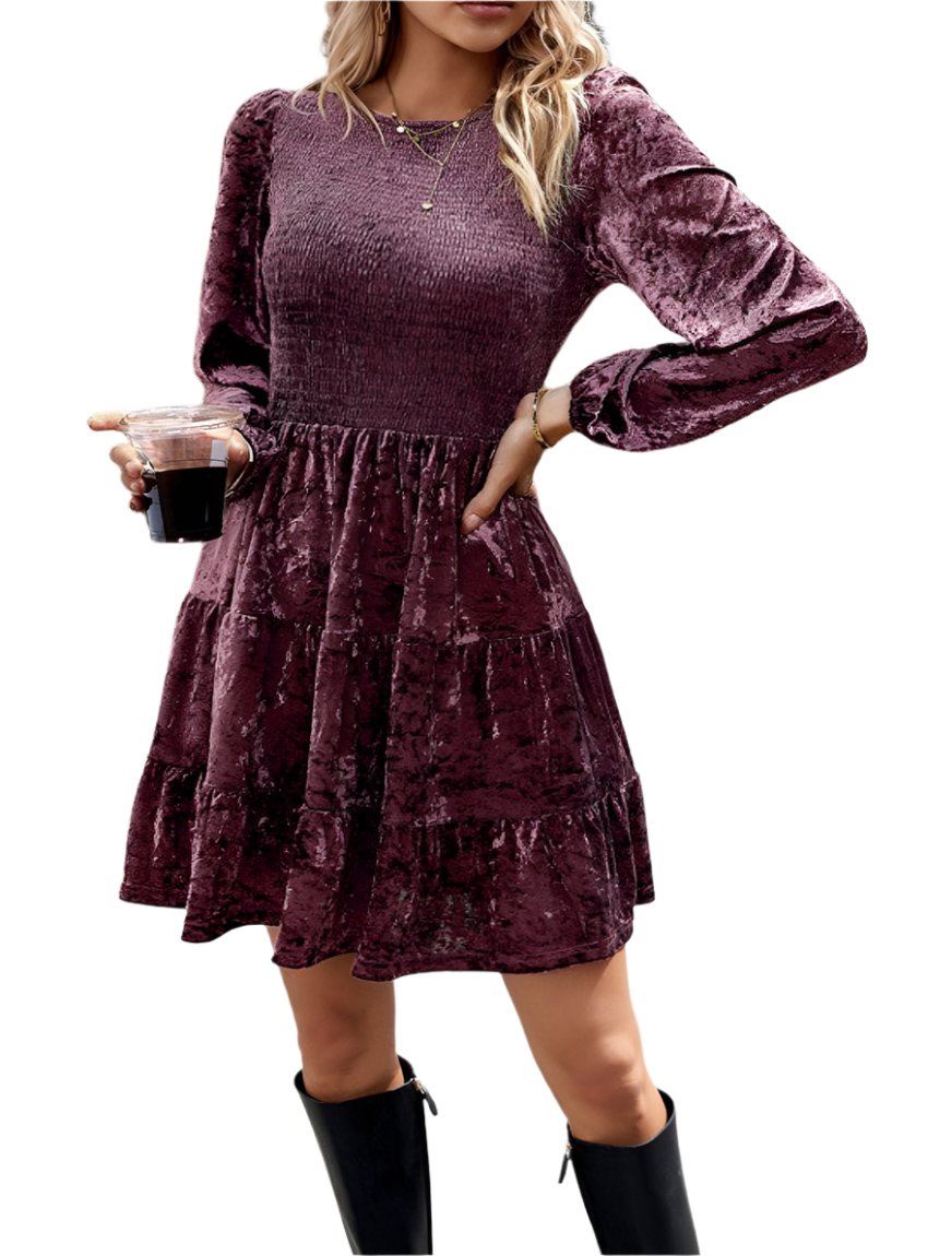 Front view of a velvet tiered dress with puff sleeves and smocked bodice
