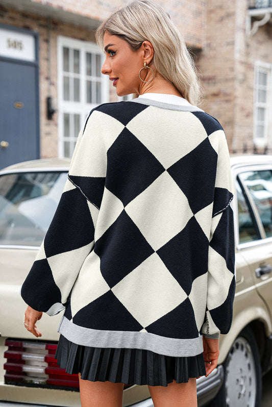 Stylish checkered cardigan with black and white pattern
