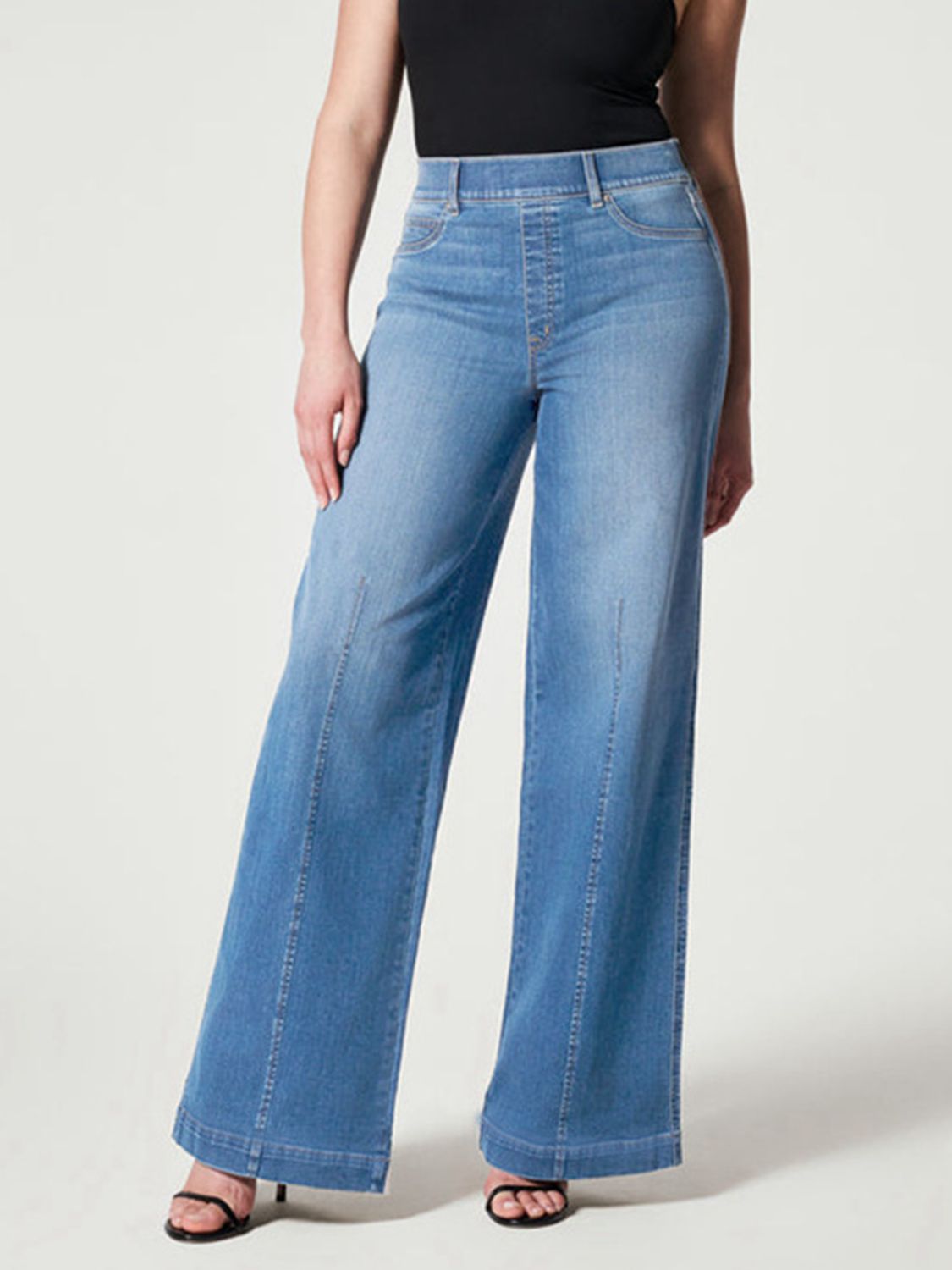 Light wash high waist wide-leg jeans with comfortable stretch.
