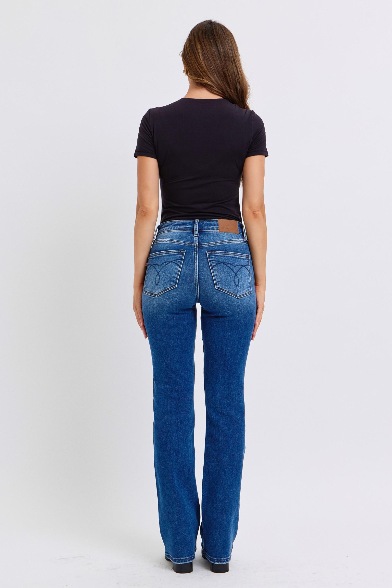 Classic bootcut jeans with a comfortable mid-rise waistline
