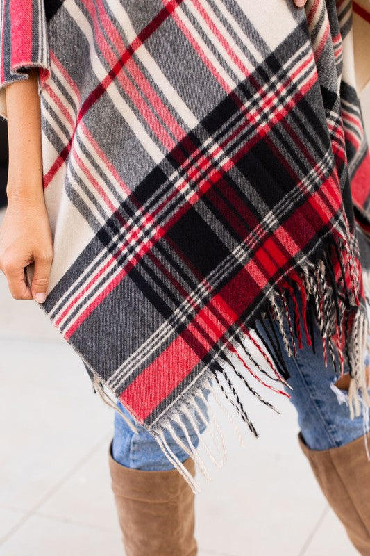 Plaid shawl with fringe, perfect for autumn layering.