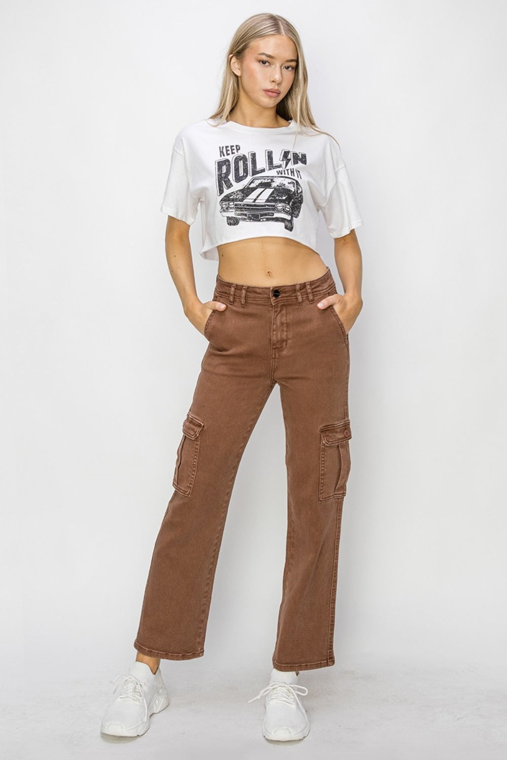 Women’s high-waist cargo jeans styled for casual outings.
