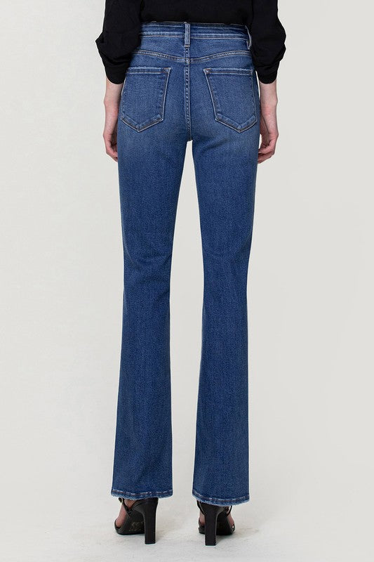 Back view of high-rise bootcut jeans in stretch denim.
