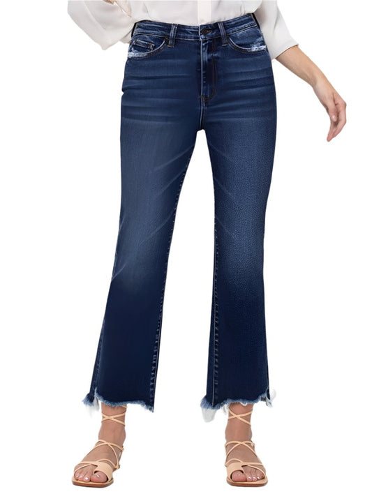 Front view of VERVET high-rise kick flare jeans with distressed hem.
