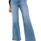 Woman wearing VERVET High Rise Wide Leg Jeans in medium wash
