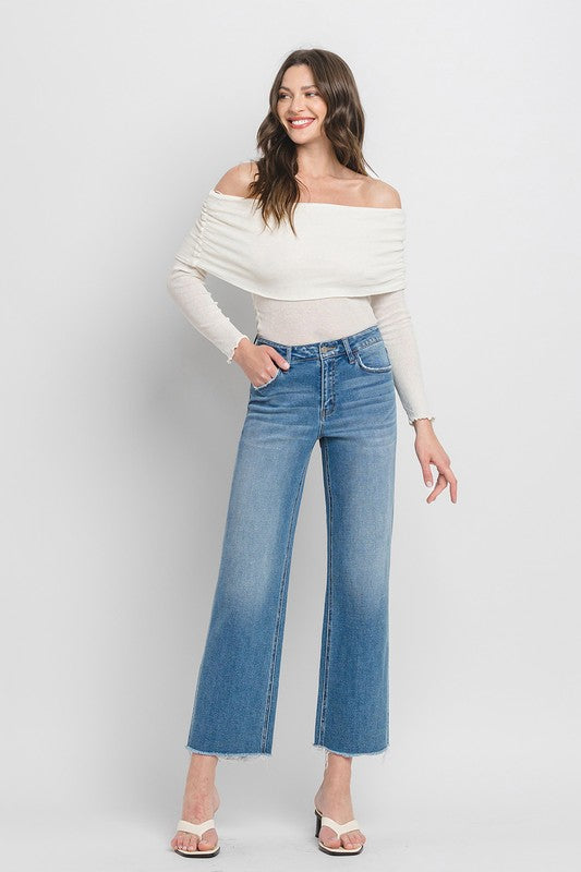 Full-length view of VERVET wide-leg ankle jeans.
