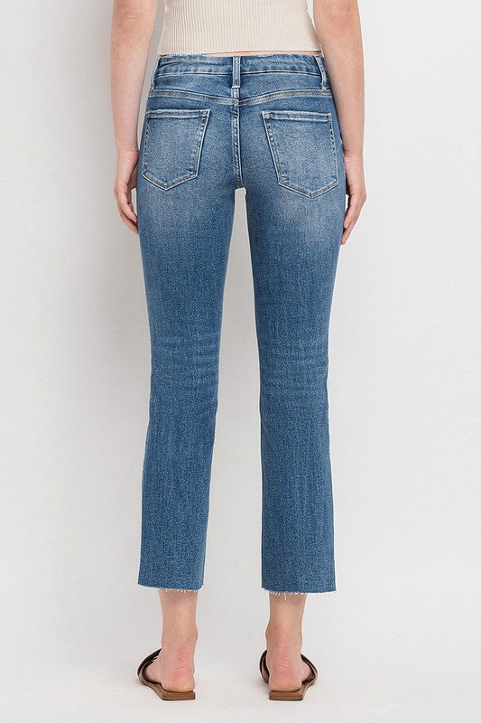 Classic cropped slim straight jeans in medium wash for a timeless look.
