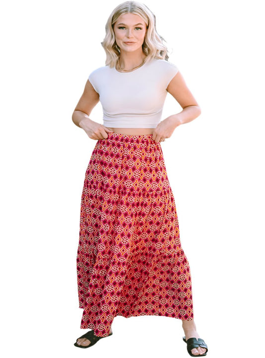 Woman wearing a colorful boho maxi skirt with vibrant patterns
