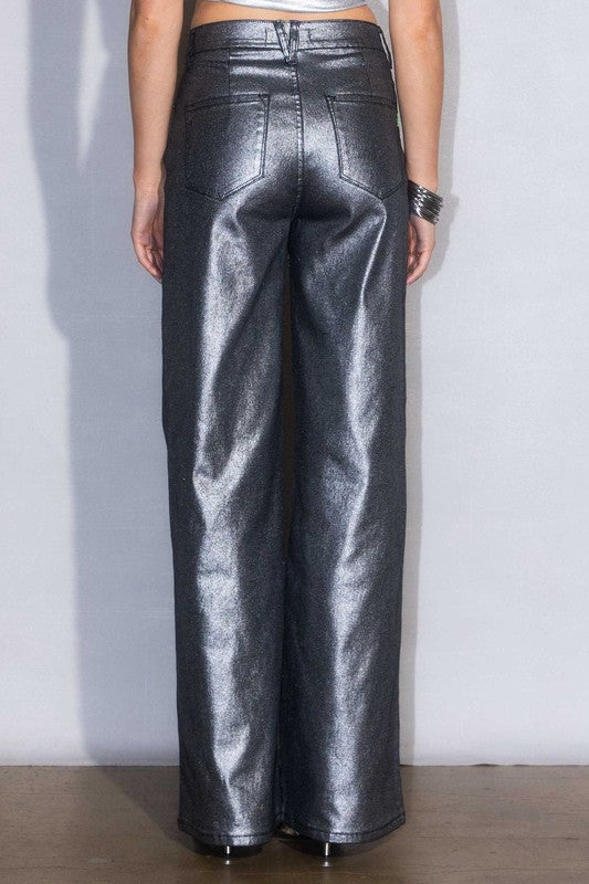 Back view of Vibrant Metallic High Rise Jeans showcasing functional pockets and bold style.
