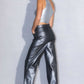 Back view of Vibrant Metallic High Rise Jeans showcasing functional pockets and bold style.
