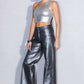 Side view of metallic high-rise jeans highlighting wide-leg silhouette and sleek fit.
