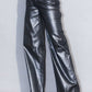 Side view of metallic high-rise jeans highlighting wide-leg silhouette and sleek fit.
