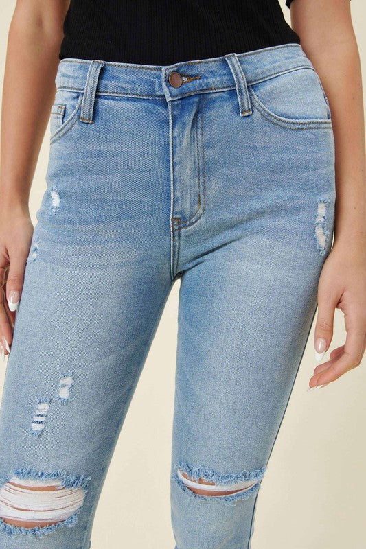 Vibrant M.i.U high waisted skinny jeans with distressed knee
