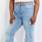 Vibrant M.i.U frayed hem plus-size denim jeans in a trendy flare silhouette.







