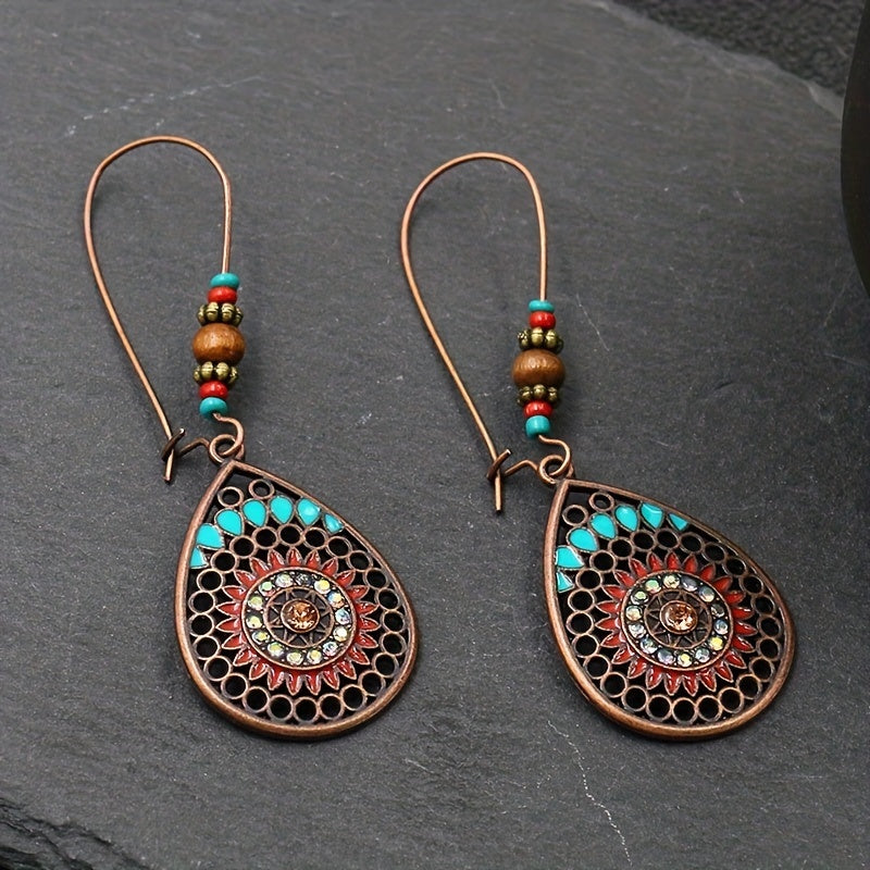 Beaded teardrop earrings in copper with colorful accents
