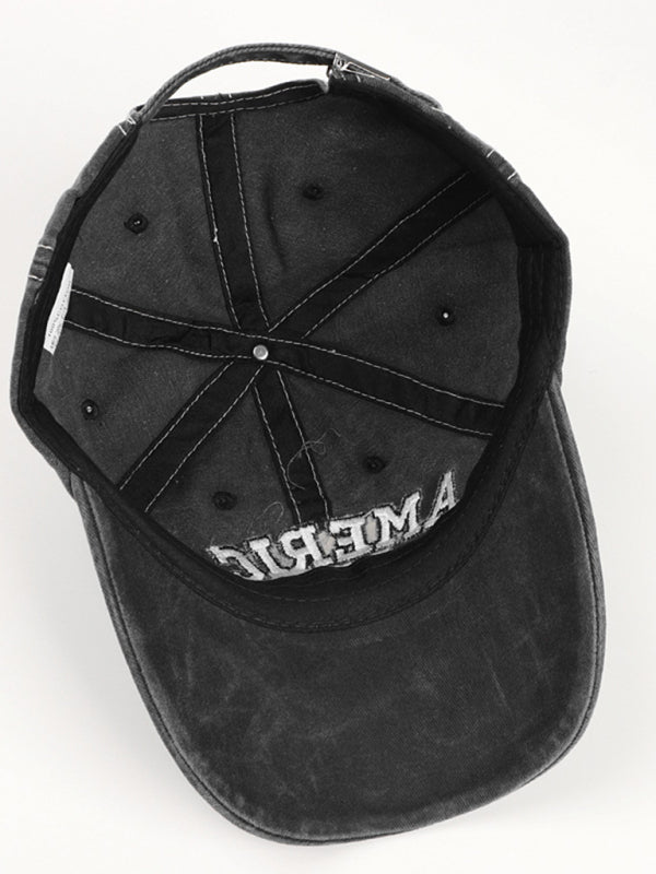 Vintage black denim hat with "America Est. 1776" and flag embroidery.
