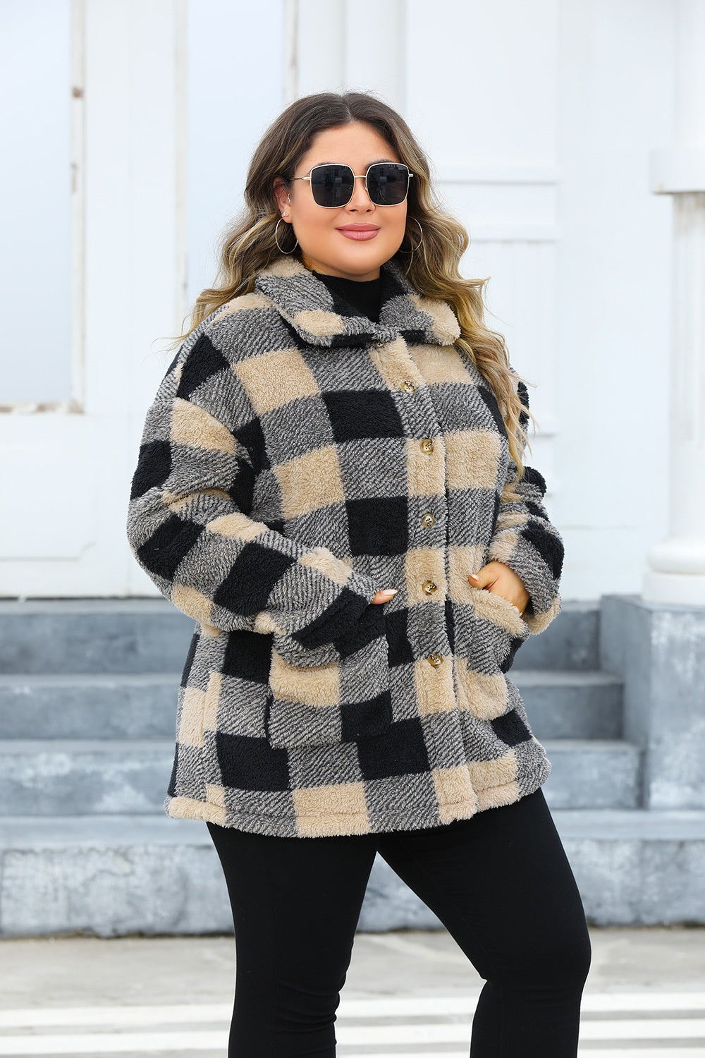 Stylish plus-size camel jacket with black checkered pattern.
