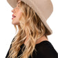 Warm winter fedora hat with fuzzy texture
