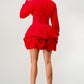 Whimsical red dress featuring long sleeves and romantic ruffles for a playful style.
