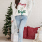 Front view of the cozy "Merry & Bright" tinsel sweater, ideal for Christmas celebrations.