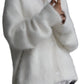 White oversized button-front cardigan with a fuzzy texture
