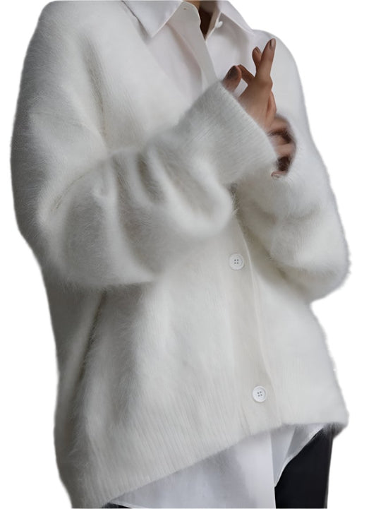 White oversized button-front cardigan with a fuzzy texture
