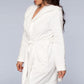 Plush white robe featuring faux fur lining and a comfortable belted design.
