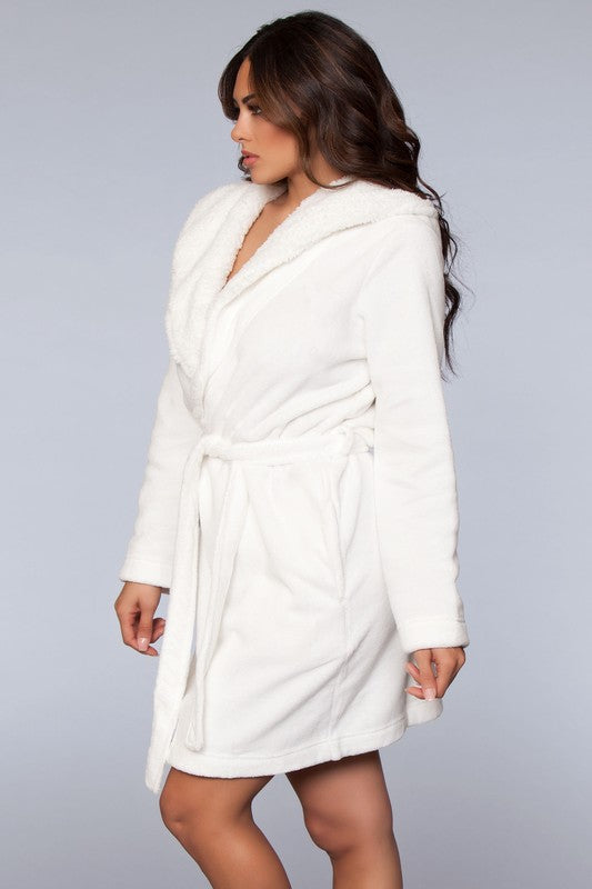 Plush white robe featuring faux fur lining and a comfortable belted design.
