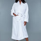 White cozy plush robe perfect for staying warm during the colder months, with a front tie belt.
