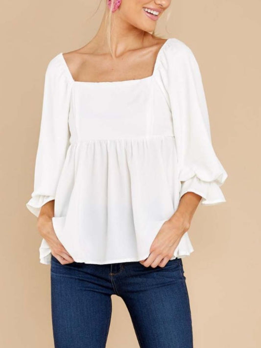 White square neck babydoll top with ruffled sleeves and a relaxed fit.
