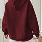 woman wearing wine waffle knit hoodie
