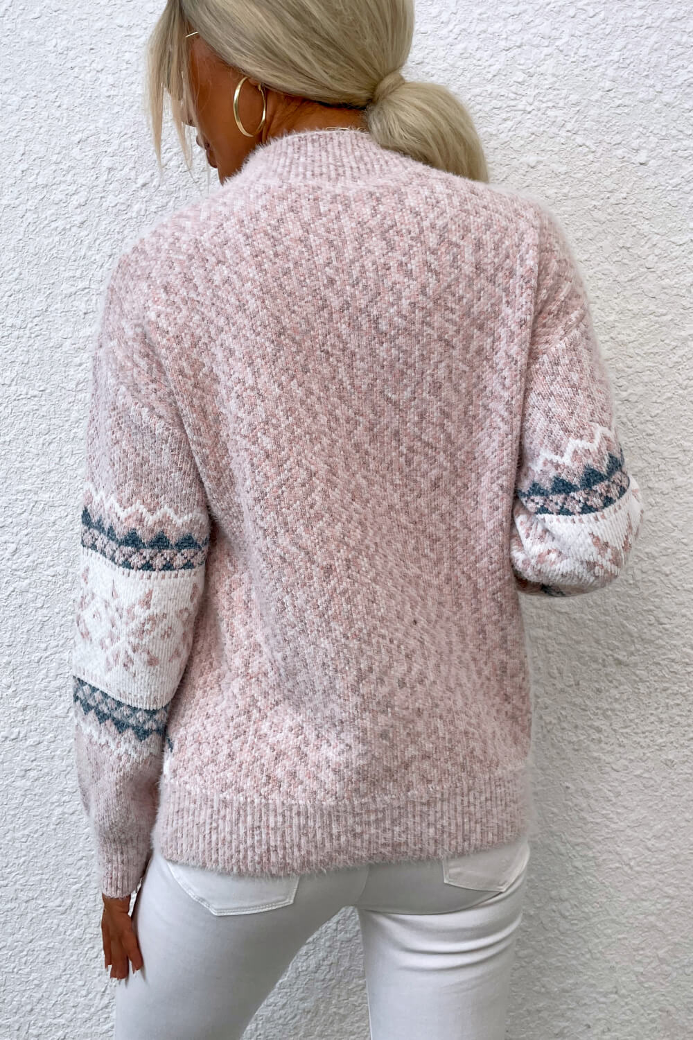 Winter pink snowflake knit sweater with a charming design, perfect for keeping warm in style.

