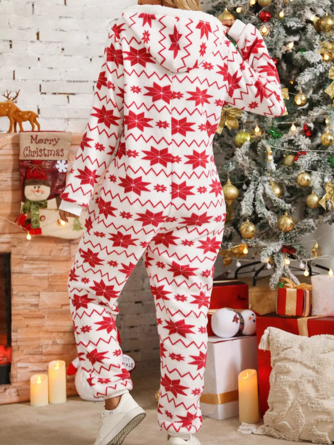 warm festive hooded onesie with snowflake pattern
