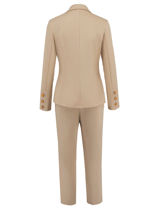 Beige blazer and pant set with elegant gold-tone buttons.
