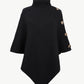 Women’s black ribbed knit poncho with cozy turtleneck.
