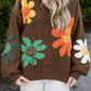 Cozy brown sweater with 60s-inspired flowers, styled with jeans
| boho aesthetic