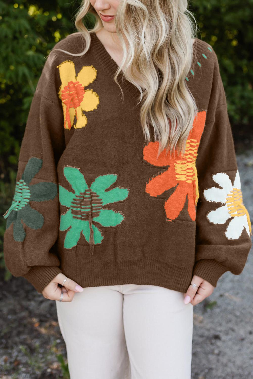 Cozy brown sweater with 60s-inspired flowers, styled with jeans
| boho aesthetic