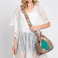 Women’s boho bucket bag featuring a colorful design with secure inner zip pocket.
