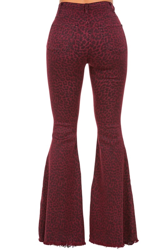 Burgundy leopard print flared jeans with a flattering high-rise fit.