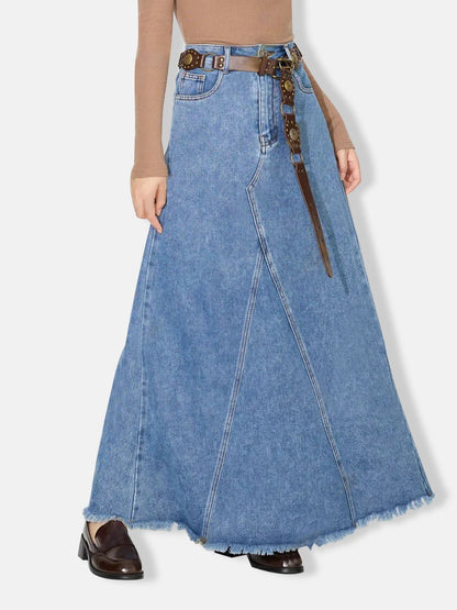 Women’s full-length denim skirt featuring a raw hem and structured seams.
